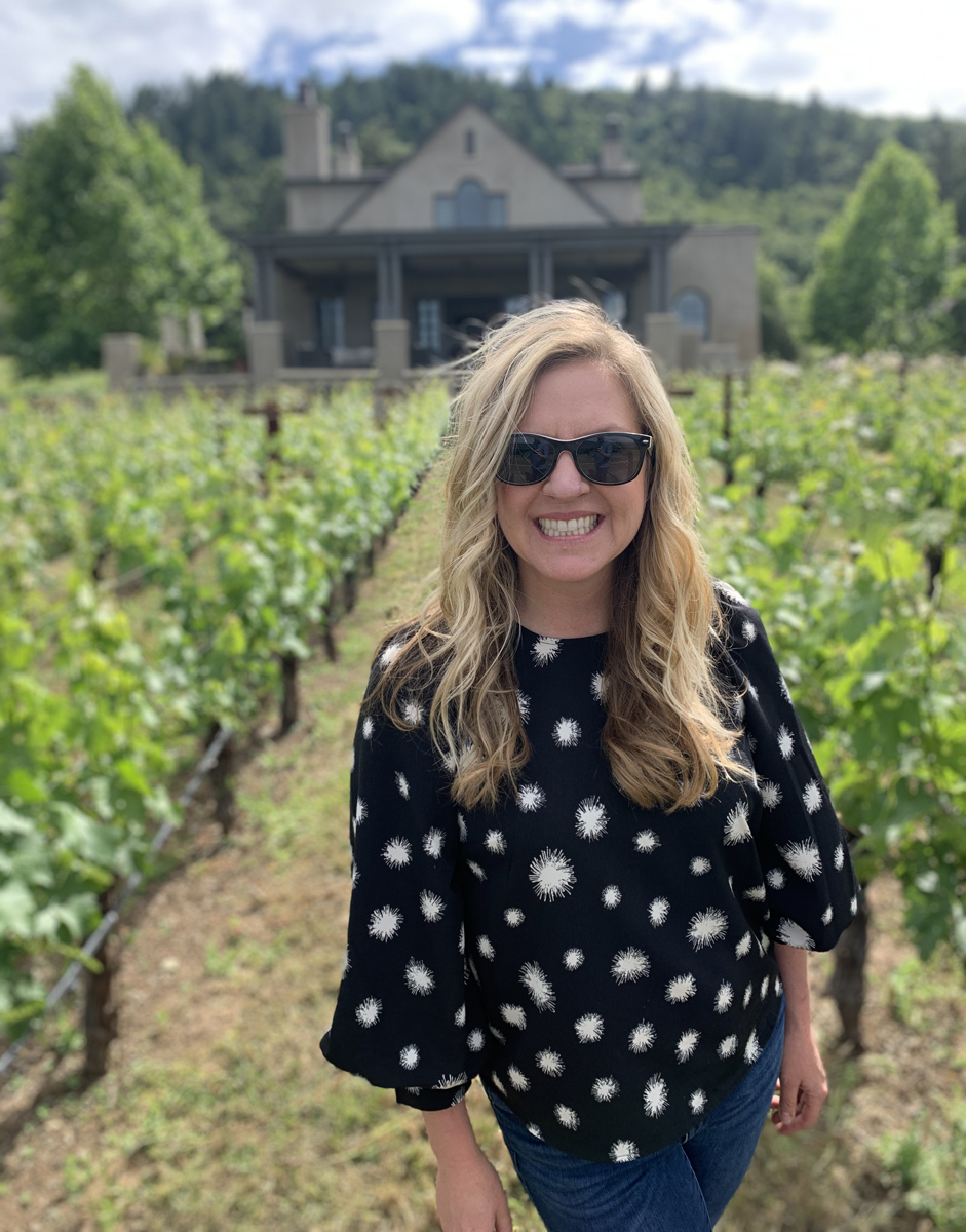 Amber Mihna in vineyard.